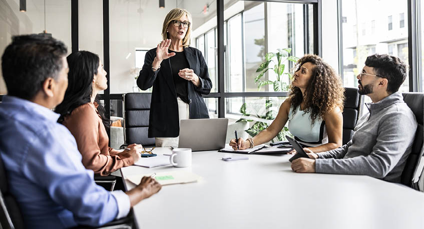 Business colleagues meeting in modern conference room