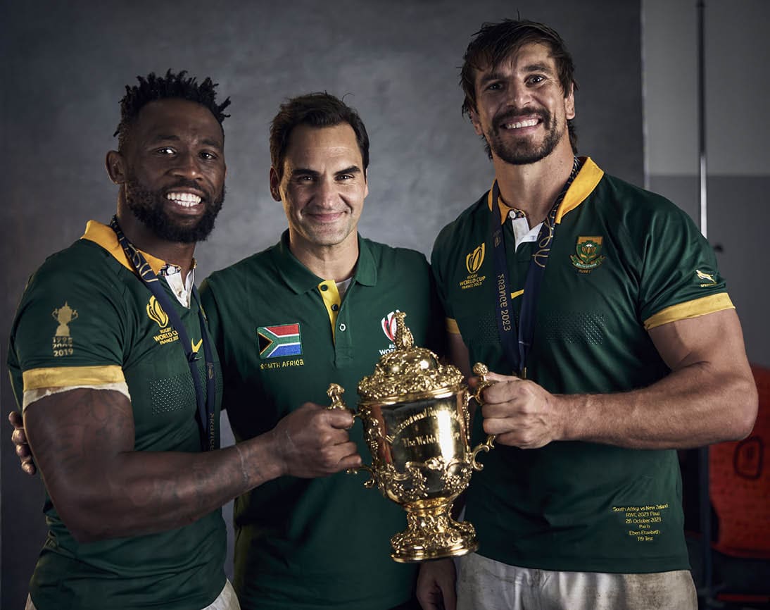 PARIS, FRANCE - OCTOBER 29: Siya Kolisi, Roger Federer and Eben Etzebeth of South Africa poses with the Webb Ellis Cup during the South Africa Winners Portrait shoot after the Rugby World Cup Final match between New Zealand and South Africa at Stade de France on October 29, 2023 in Paris, France. (Photo by Adam Pretty - World Rugby/World Rugby via Getty Images)