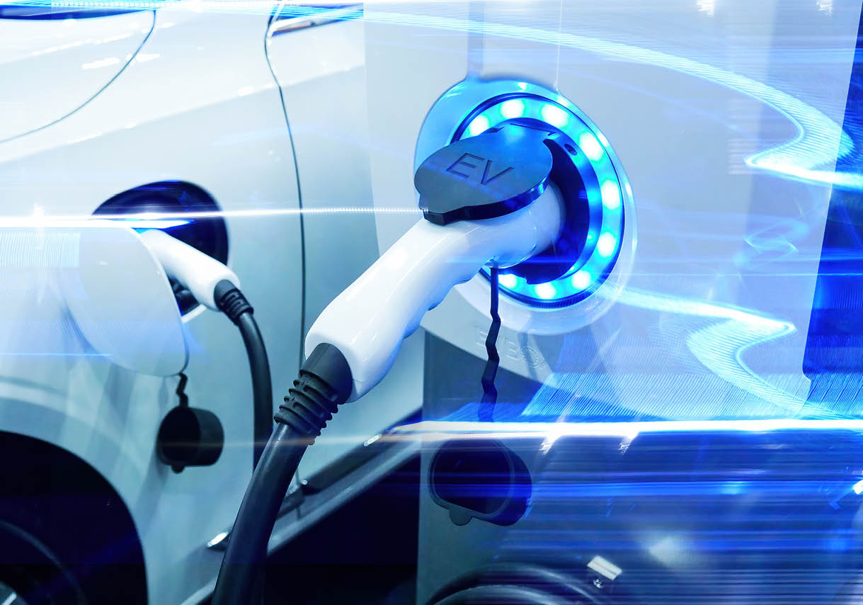 Power supply connect to electric vehicle for charge to the battery. Charging technology industry transport which are the futuristic of the Automobile. EV fuel Plug in hybrid car.