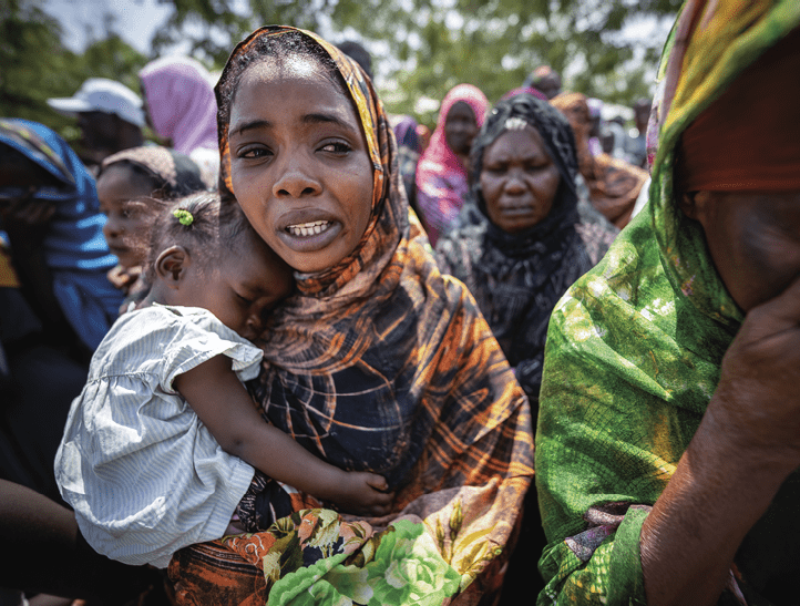26 January 2024, South Sudan, Juba: Refugee women cry in the Gorom refugee settlement during Foreign Minister Baerbock's visit. Photo: Michael Kappeler/dpa (Photo by Michael Kappeler/picture alliance via Getty Images)