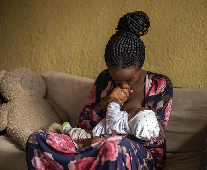 Afissa Usanase is a single mother of a two month old baby. She is just 17 years old. She dropped out from school due to her family's economic situation. For her, being a mother is having a child. In Rwandan culture, single mothers are considered an outcast, pariah, or viewed as someone who rejects cultural values and dignity because they have sex before marriage. Rwanda. (Photo by: Jean_Bizimana/Majority World/Universal Images Group via Getty Images)