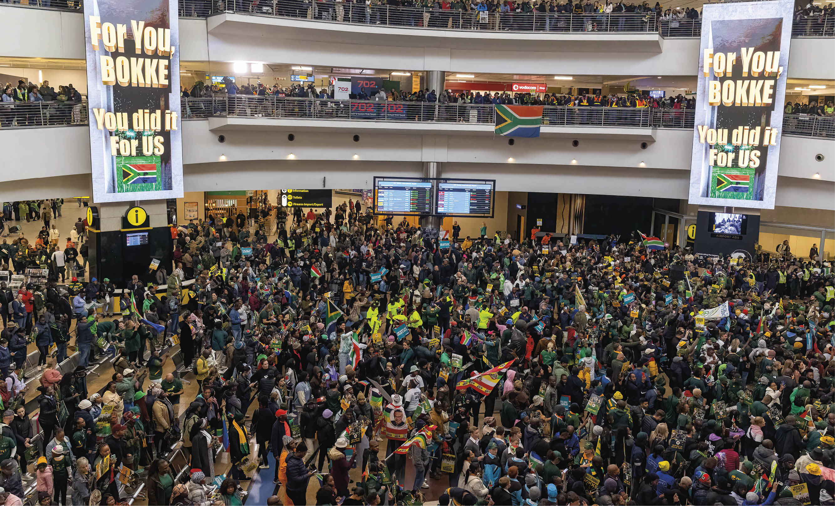 KEMPTON PARK, SOUTH AFRICA - OCTOBER 31: Fans wait for the Springboks to arrive at OR Tambo International Airport on October 31, 2023 in Kempton Park, South Africa. The Springboks made history when they beat fierce rivals New Zealand in Paris to win a record fourth Rugby World Cup title. (Photo by Alet Pretorius/Gallo Images via Getty Images)