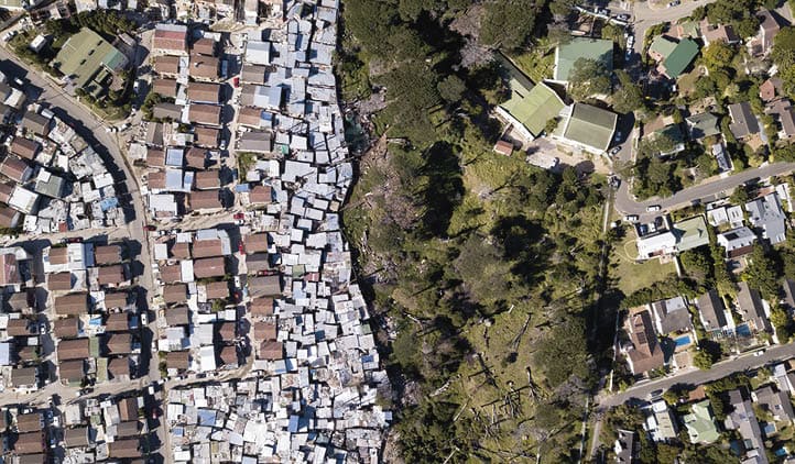 Aerial overhead township and middle class houses in South Africa