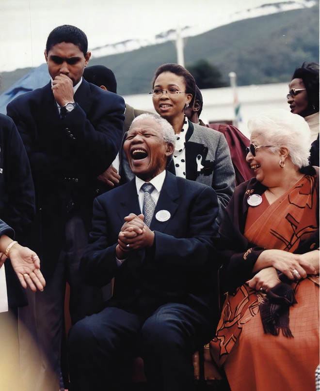 SOUTH AFRICA: South African president Nelson Mandela shares a light moment with Frene Ginwala. (Photo by Die Burger/Gallo Images via Getty Images)