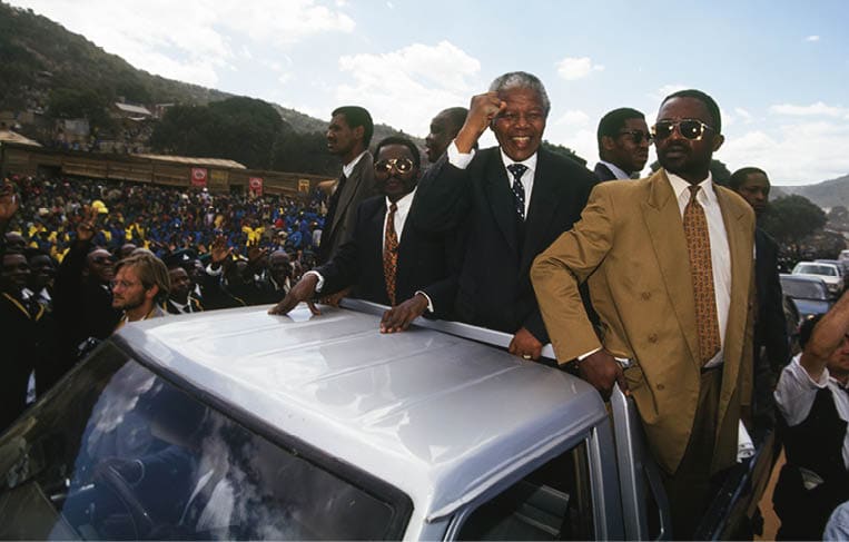 Pilgrims surround the Zion Christian Church in Moria, South Africa, for an annual pilgrimage which will be attended by African National Congress (ANC) leader Nelson Mandela, South African President F.W. de Klerk, and Inkatha Freedom Party leader Mangosuthu Buthelezi. (Photo by Brooks Kraft LLC/Sygma via Getty Images)