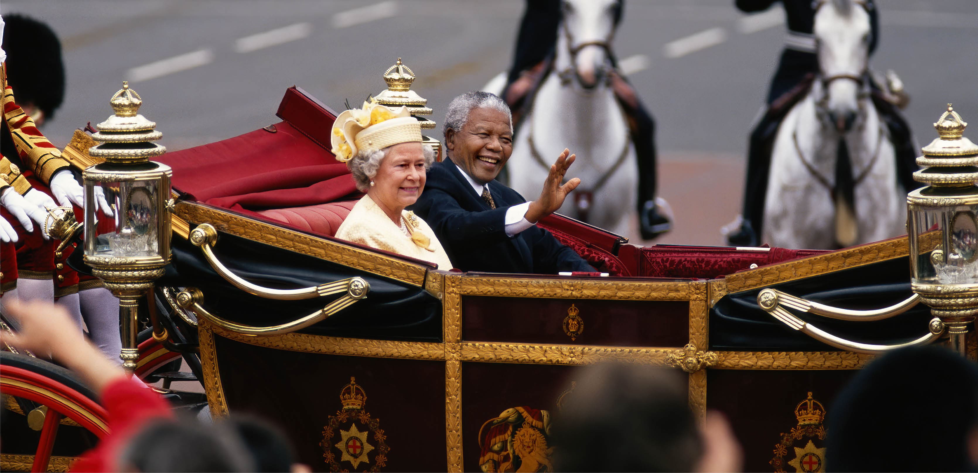 LONDON, UNITED KINGDOM - JULY 1996: South African President Nelson Mandela pictured with her Majesty, Queen Elizabeth II, during his state visit to Great Britain in 1996. (Photo by Tom Stoddart/Getty Images)