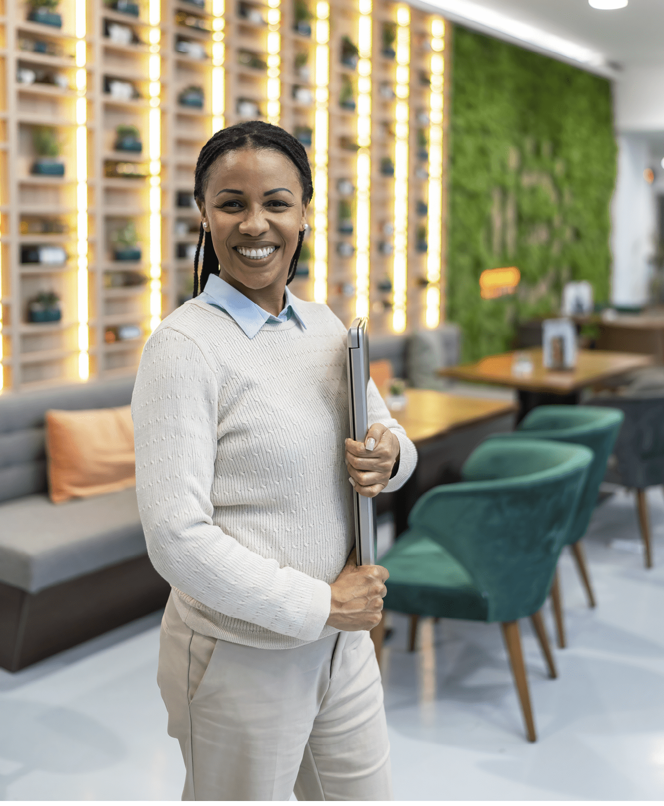 Portrait of smiling female owner of bar restaurant or coffee shop