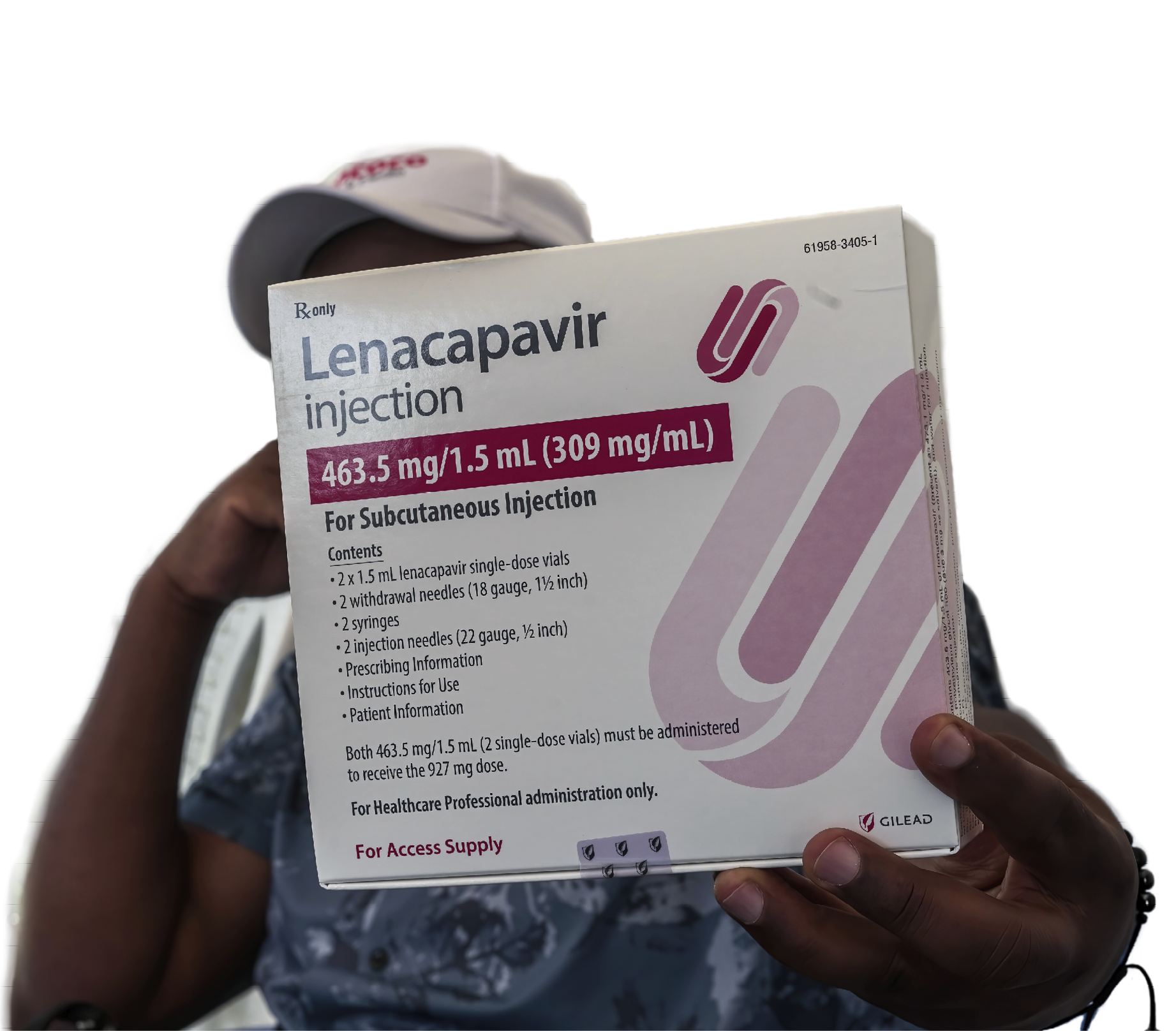NAKURU, KENYA - 2026/03/26: A man holds a packaging containing lenacapavir, a long-acting HIV pre-exposure prophylaxis (PrEP) injection, during the drug's rollout in Nakuru. Kenya is rolling out Lenacapavir, a long-acting injectable pre-exposure prophylaxis (PrEP) drug that provides up to six months of protection with a single injection. (Photo by James Wakibia/SOPA Images/LightRocket via Getty Images)
