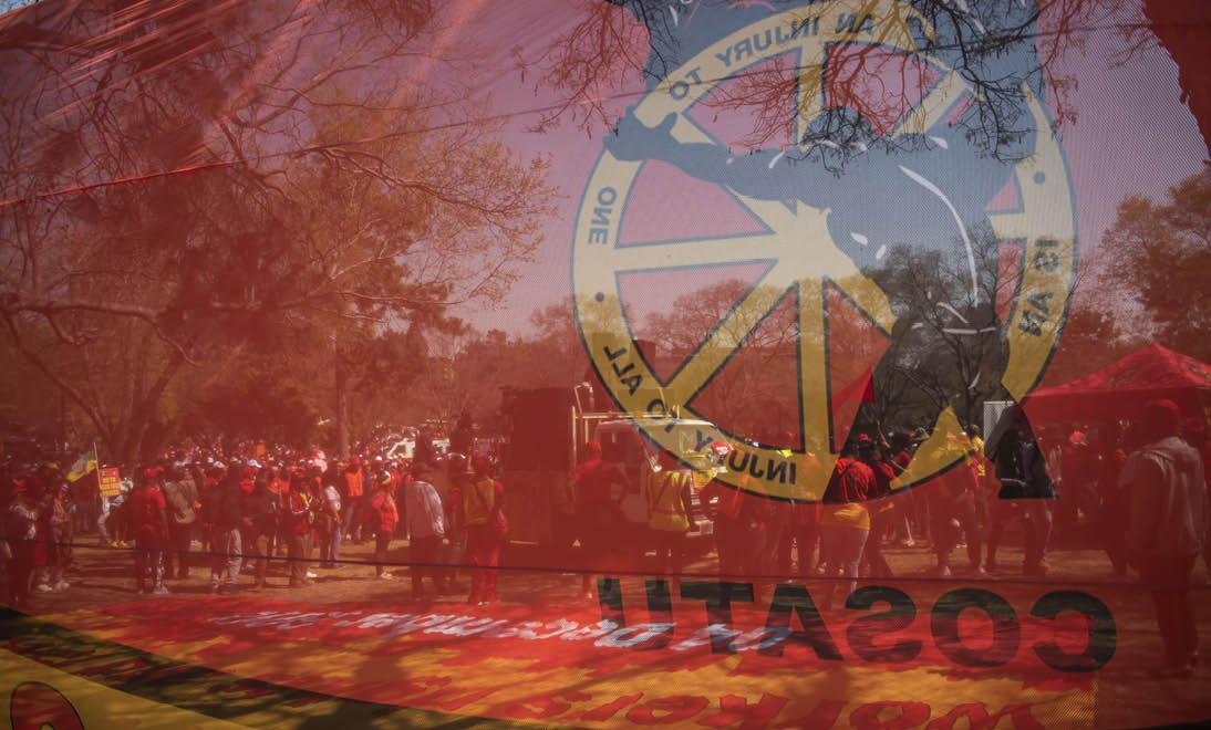 PRETORIA, SOUTH AFRICA - AUGUST 24: Members of several unions marching through Pretoria city on the way to the Union building during the national shutdown march on August 24, 2022 in Pretoria, South Africa. The Congress of South African Trade Unions (COSATU) issued a call to all workers and South Africans to join its national strike to address the rising living costs, unemployment, crime, load shedding and rising fuel prices. (Photo by Alet Pretorius/Gallo Images via Getty Images)