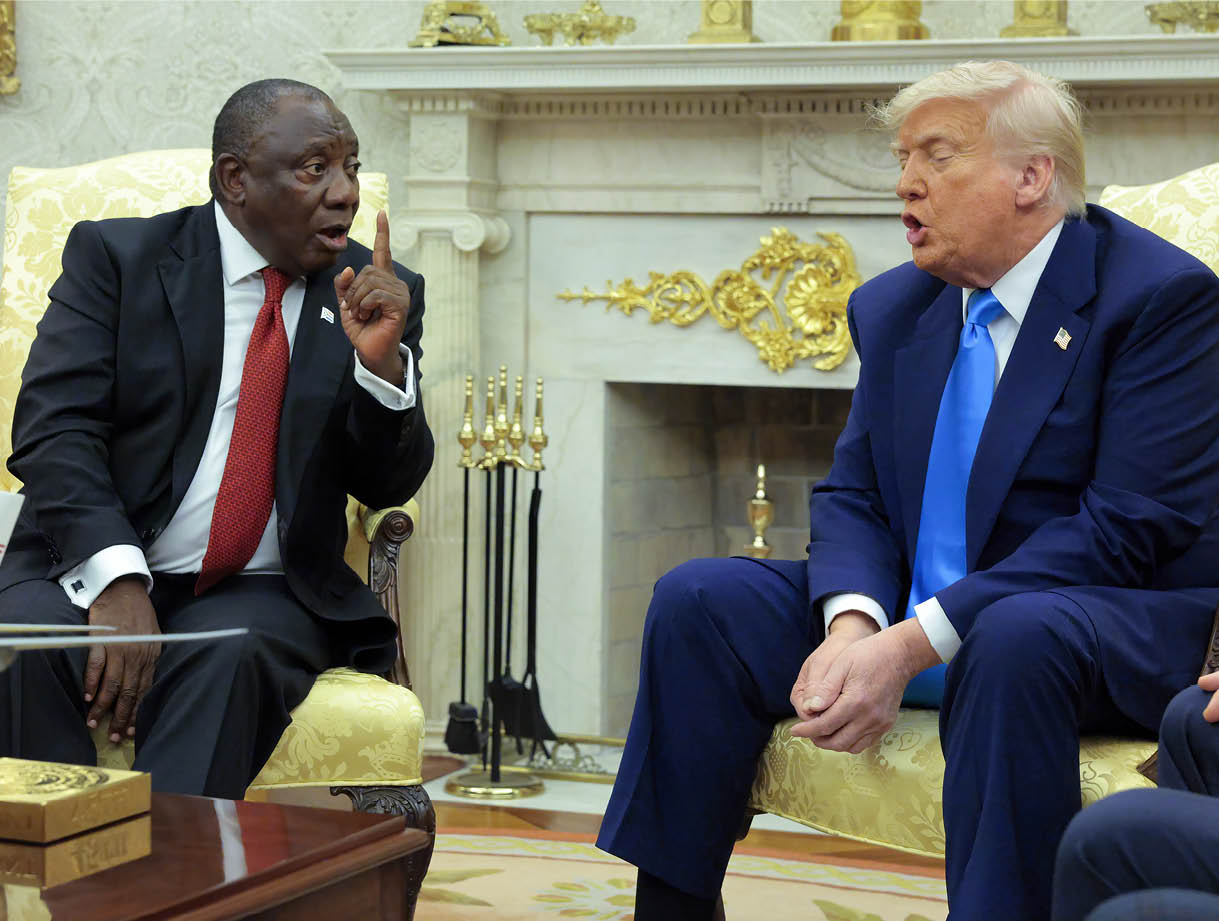 WASHINGTON, DC - MAY 21: President of South Africa Cyril Ramaphosa (L) and U.S. President Donald Trump exchange words during a meeting in the Oval Office of the White House on May 21, 2025 in Washington, DC. Relations between the two countries have been strained since Trump signed an executive order in February that claimed white South Africans are the victims of government land confiscation and race-based “genocide” while admitting some of those Afrikaners as refugees to the United States. Trump also halted all foreign aid to South Africa and expelled the country’s Ambassador to the U.S. Ebrahim Rasool. (Photo by Chip Somodevilla/Getty Images)
