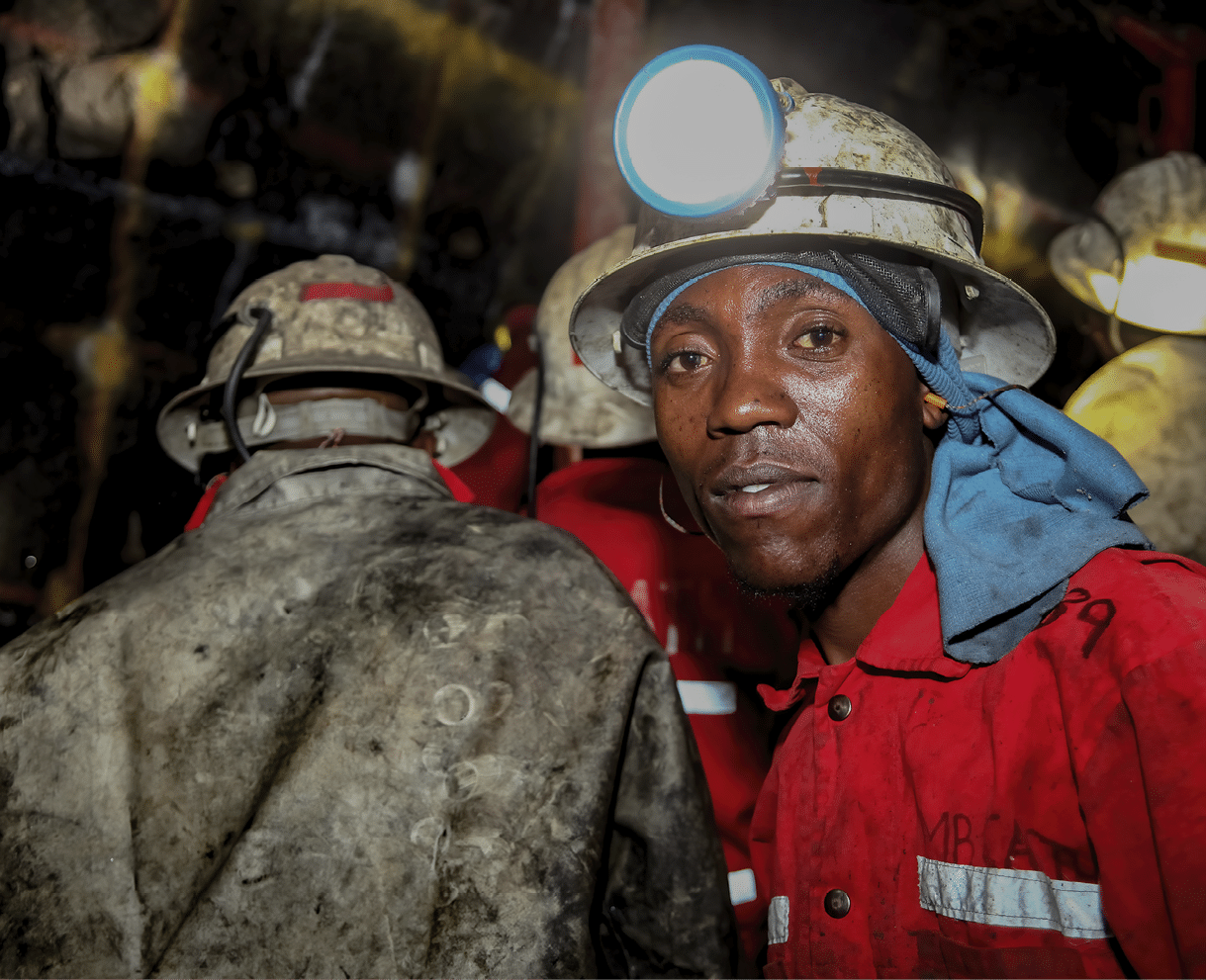 Rustenburg, South Africa, May 23, 2011, Underground Platinum Chrome miners drilling holes in rock for blasting. Holes used for dynamite placement