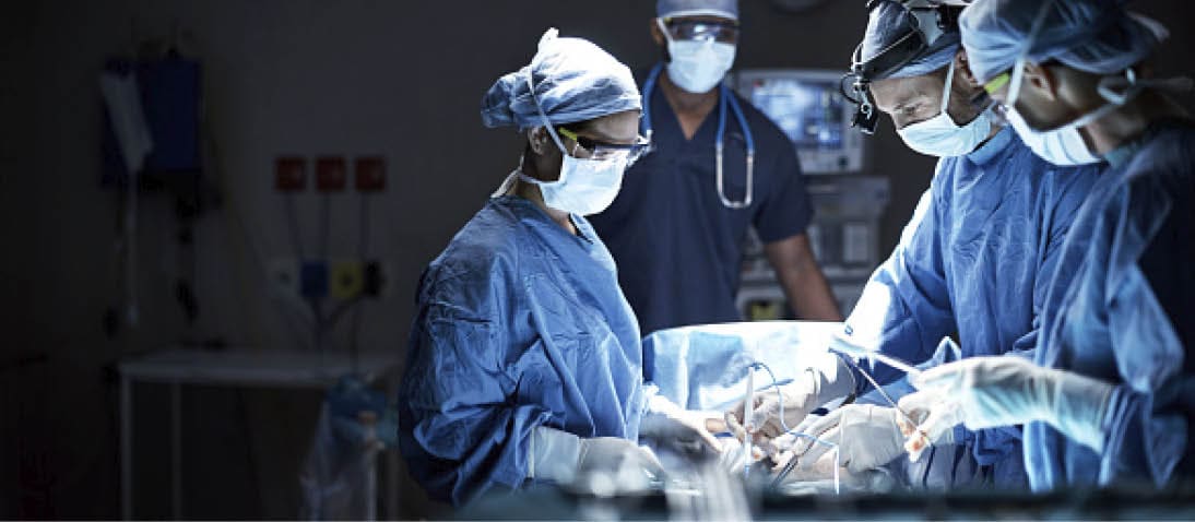Shot of a team of surgeons performing a surgery in an operating room