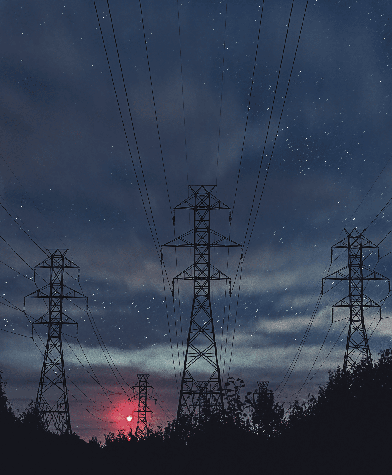 High voltage power lines under crisp and very clear Autumn night skies. Long exposure.