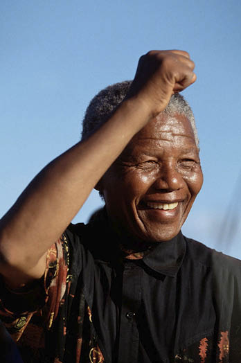 Nelson Mandela speaks to supporters at a campaign event. After more then 27 years in jail as an anti-apartheid activist, Nelson Mandela lead a 1994 campaign for President as a member of the African National Congress (ANC), in the first free elections in South Africa in 1994. Mandela has received more than 250 awards over four decades, including the 1993 Nobel Peace Prize. (Photo by Brooks Kraft LLC/Sygma via Getty Images)