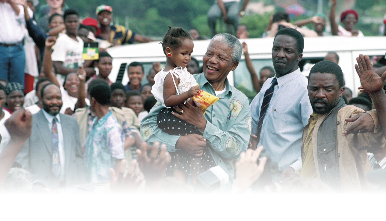 383912 18: Nelson Mandela, the former president of South Africa on April 21, 1994 at a pre-election rally in Durban days before the historic democratic election on April 27, 1994 in South Africa. Mr Mandela became the first black democratic elected president in South Africa. He retired from office after one term in June 1999. (Photo by Per-Anders Pettersson/Liaison Agency)