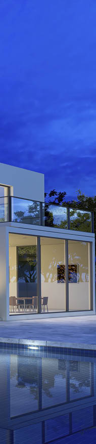 luxurious villa with swimming pool at dusk