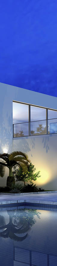 luxurious villa with swimming pool at dusk