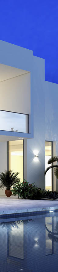 luxurious villa with swimming pool at dusk