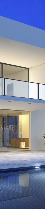 luxurious villa with swimming pool at dusk