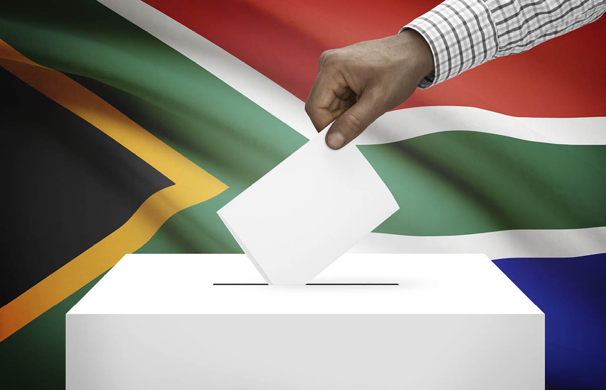 Ballot box with national flag on background - South Africa