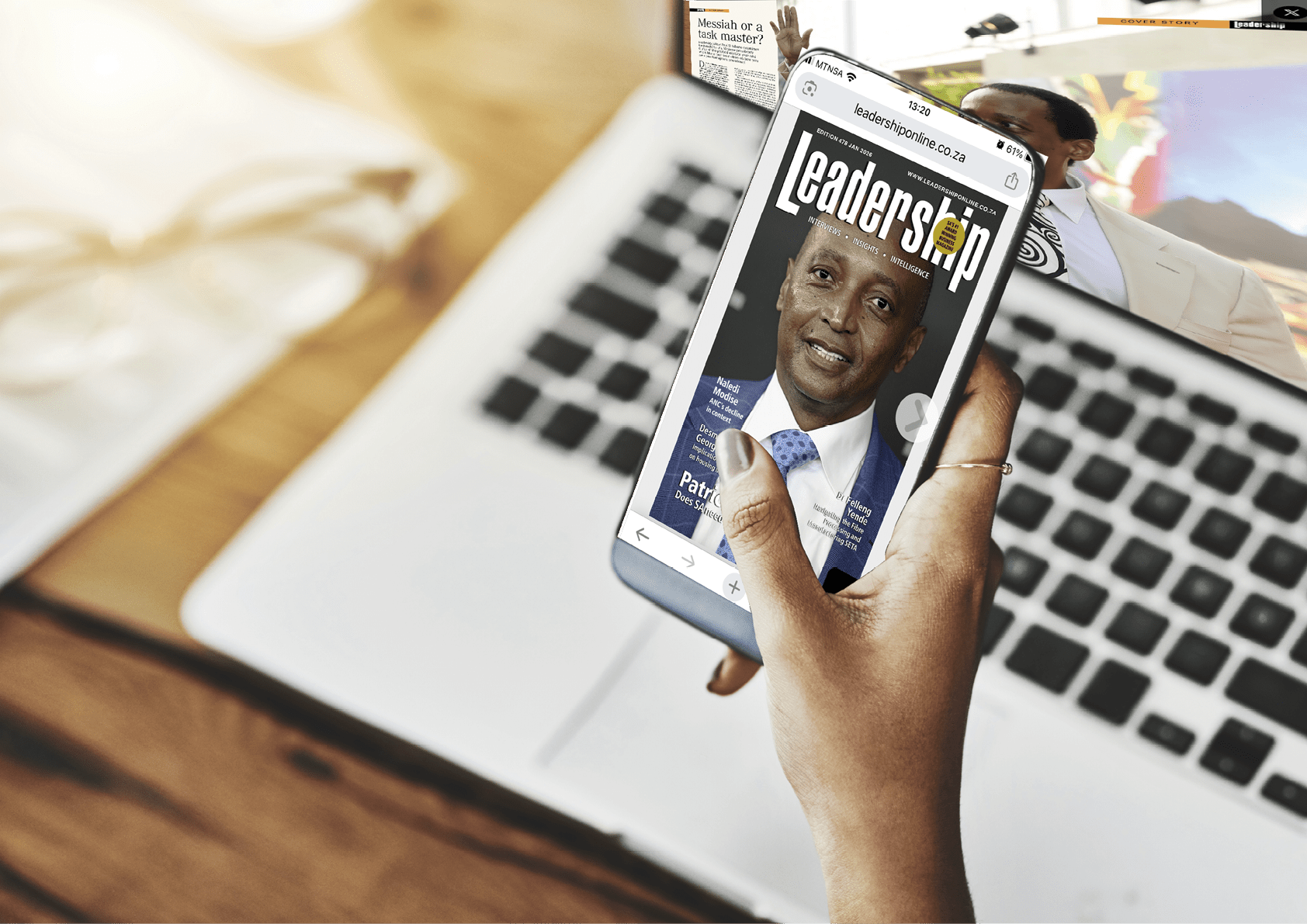 Closeup shot of an unidentifiable businesswoman using a cellphone while working in an office